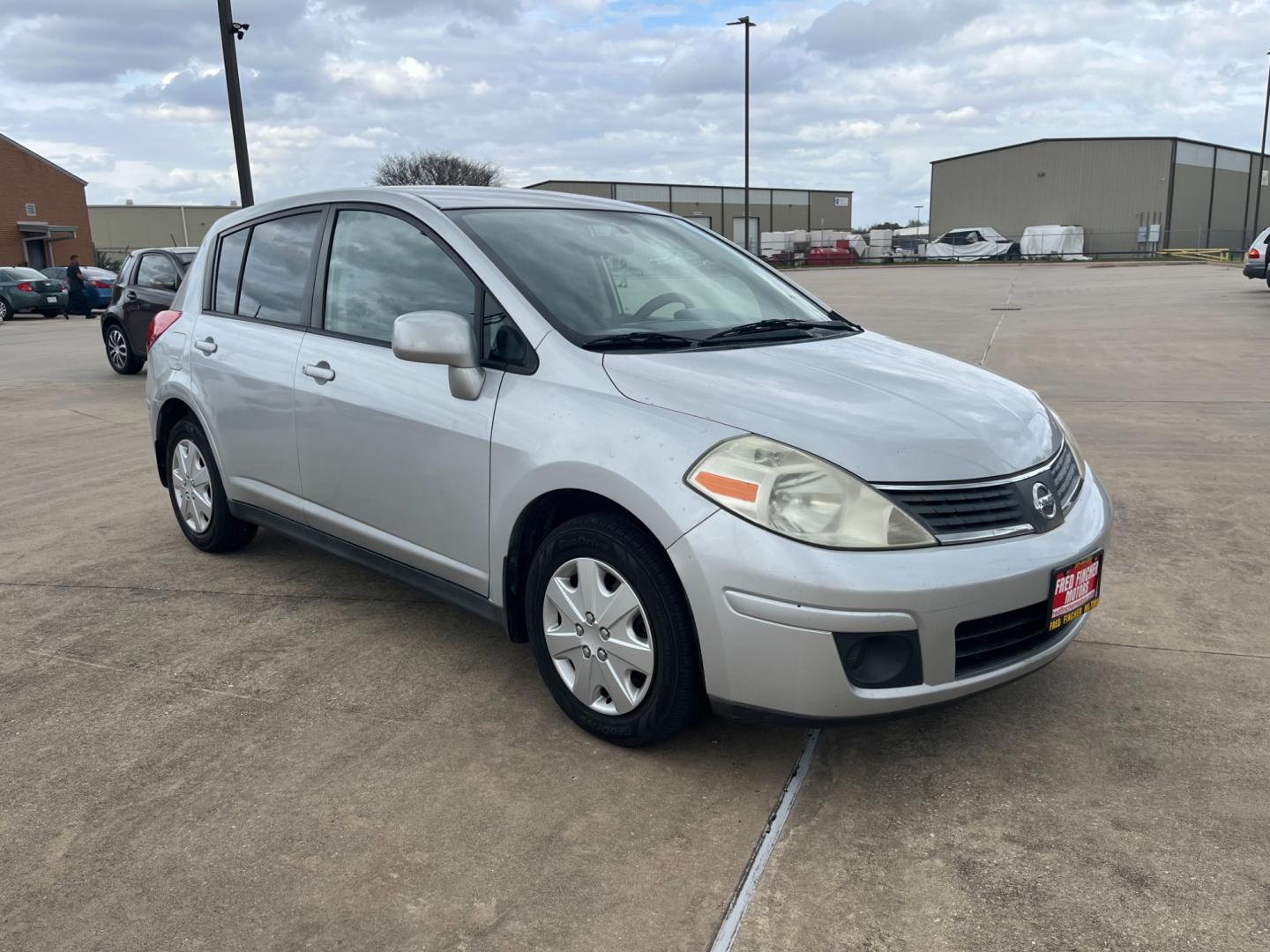 2009 SILVER /black Nissan Versa 1.8 S Hatchback (3N1BC13E09L) with an 1.8L L4 DOHC 16V engine, Manual transmission, located at 14700 Tomball Parkway 249, Houston, TX, 77086, (281) 444-2200, 29.928619, -95.504074 - Photo#0